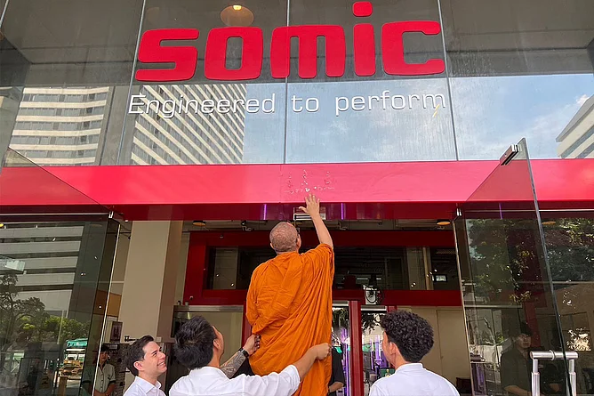 Official blessing of the SOMIC facility in Bangkok by a monk.
