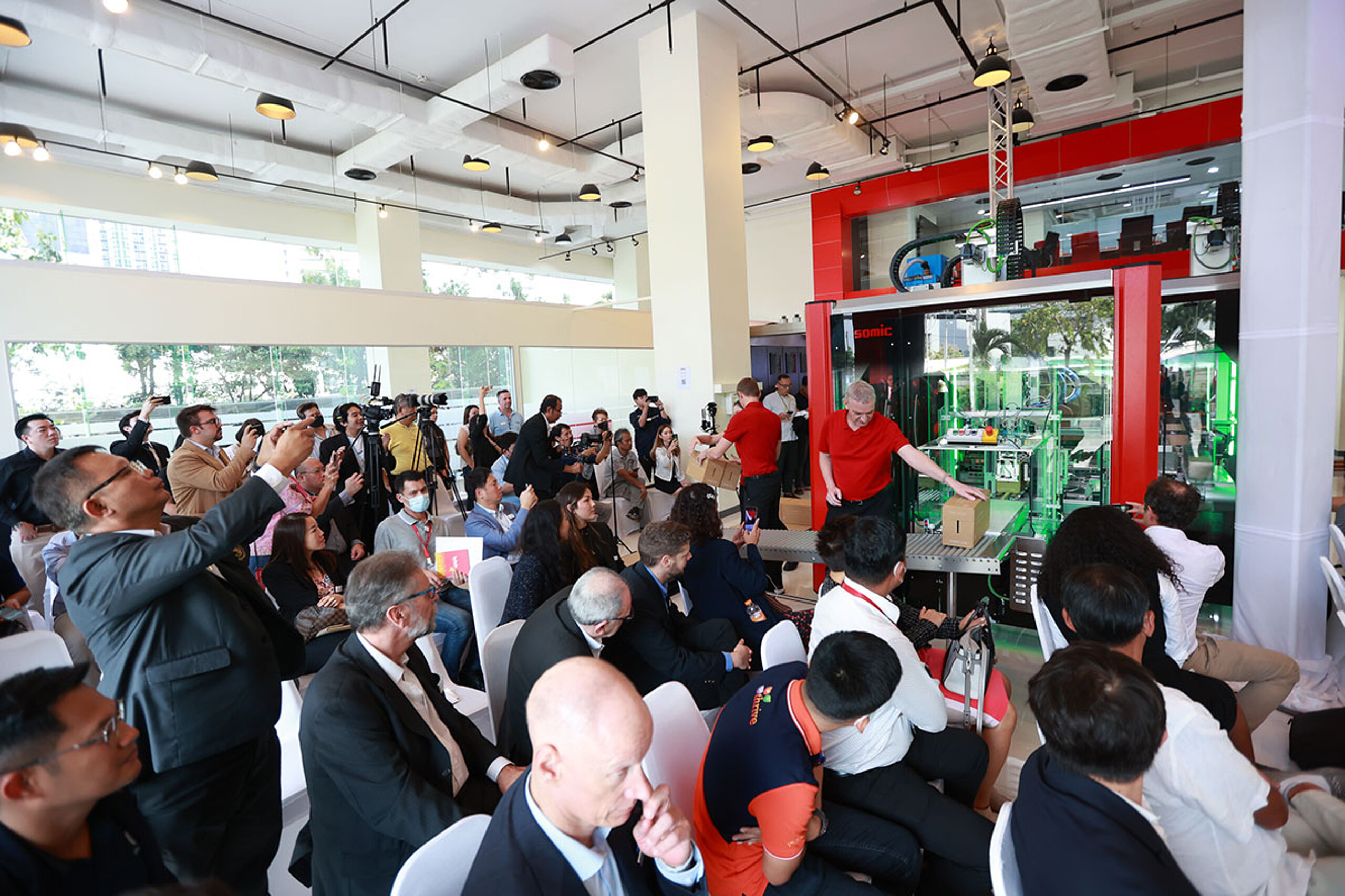 Demonstration of the SOMIC 434 cartoning machine during the opening ceremony of the SOMIC facility in Bangkok.